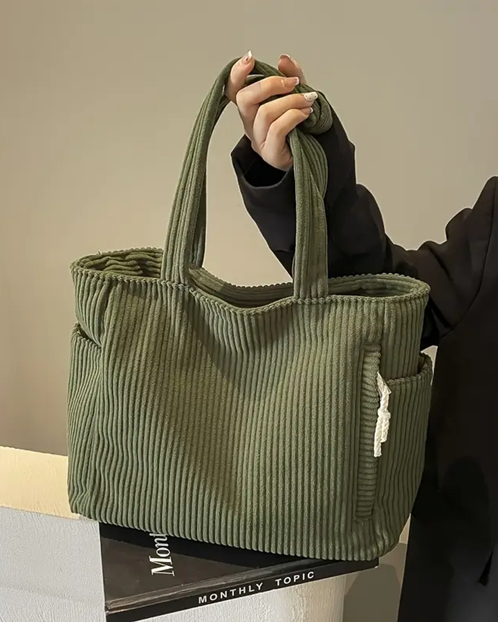 Rosa – Ribbet mulepose med snore-detalje