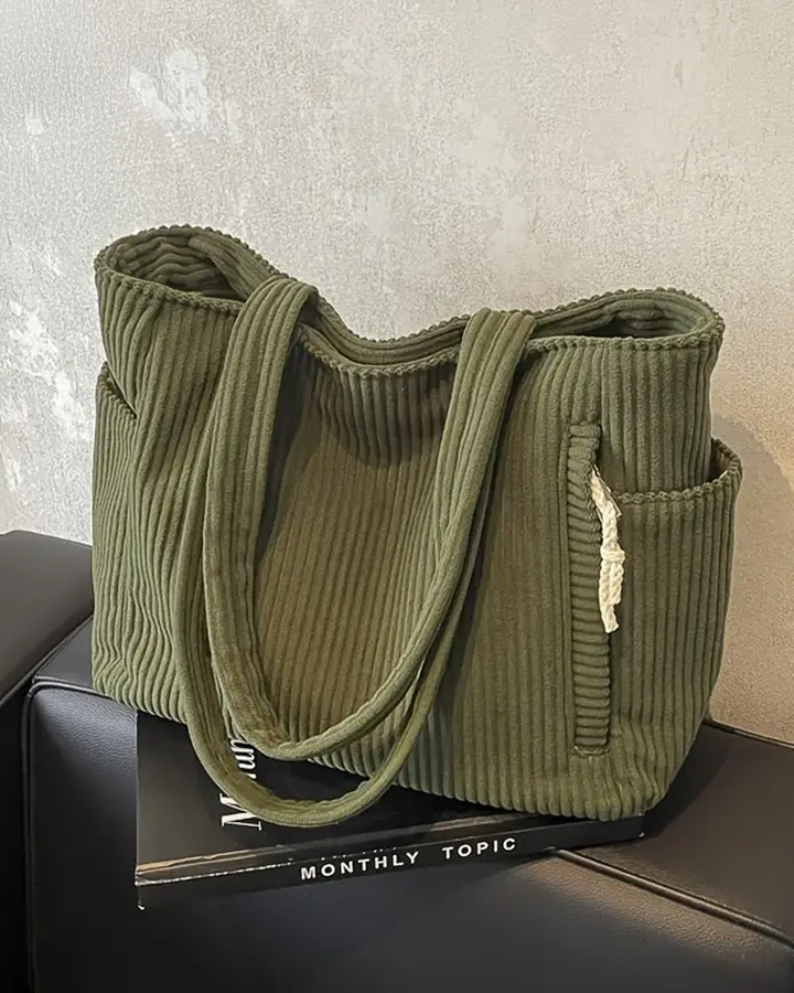 Rosa – Ribbet mulepose med snore-detalje